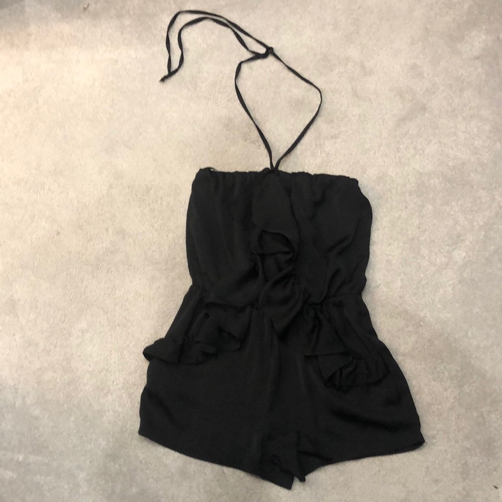 Black ruffled romper